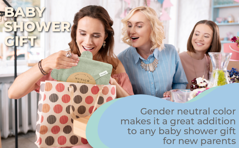 3 ladies appreciating the perfect baby shower gift - a gender neutral addition to diaper bag