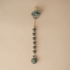 mushie silicone Luna pacifier clip