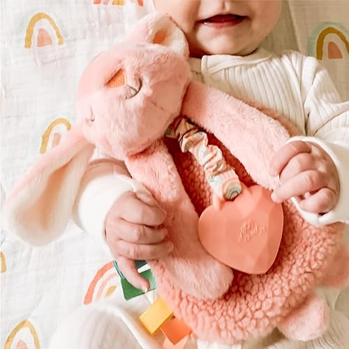 Itzy Ritzy - Itzy Lovey Including Teether - Baby Lovey with Teether, Textured Ribbons & Dangle Arms - Features Crinkle Sound, Sherpa Fabric and Minky Plush (Pink Bunny) - Jamouz
